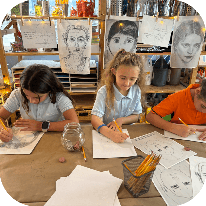 Children and teacher in elementary setting